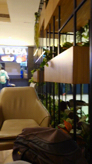 Resting in Aeromall with a Red Bull in my hand!